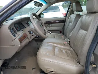 2005 Mercury Grand Marquis GS z VIN 2MEFM74W05X673934, wystawiony jako Copart lot #52608785 z przebiegiem 170 558 mil mil oraz Szkody całkowita. Historia ofert i sprzedaży dostępna na DreamBid. Obrazek 7.