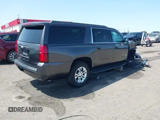 2018 Chevrolet Suburban LT with VIN 1GNSCHKCXJR128787, listed as a IAAI auction lot 41909965 with 123,020 mi miles. Bid and sale history available at carsss.com. Image 4.