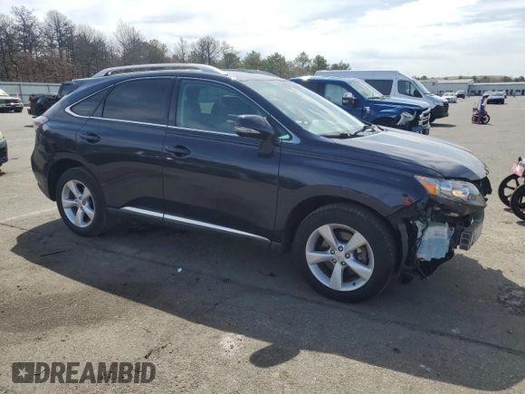 2010 Lexus RX 350 with VIN 2T2BK1BAXAC021813, listed as a Copart auction lot 52675365 with 221,947 mi miles and Salvage Title. Bid and sale history available at DreamBid. Image 4.