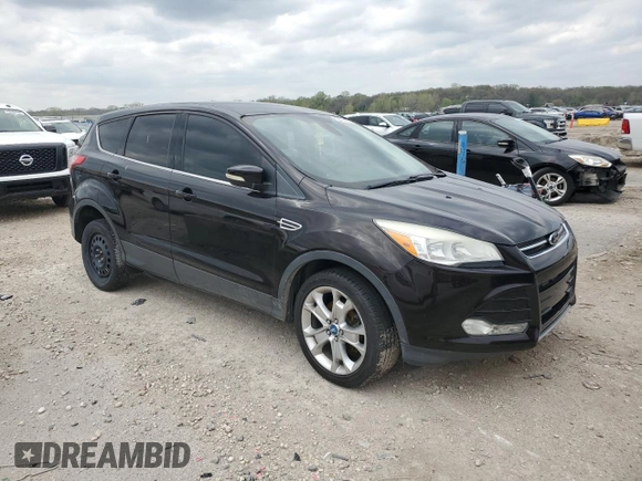 2013 Ford Escape SEL with VIN 1FMCU0H97DUB98140, listed as a Copart auction lot 53674965 with 135,378 mi miles and Clean Title. Bid and sale history available at carsss.com. Image 4.