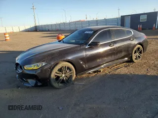 2020 BMW 8 Series M850i with VIN WBAGV8C08LCE52579, listed as a Copart auction lot 43185735 with 55,574 mi miles and Salvage Title. Bid and sale history available at carsss.com. Image 1.