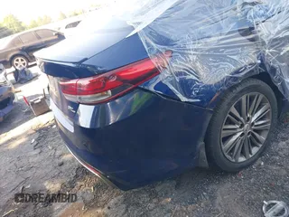 2016 Kia Optima SXL Turbo with VIN 5XXGV4L28GG087563, listed as a IAAI auction lot 39986124 with 180,160 mi miles. Bid and sale history available at carsss.com. Image 12.