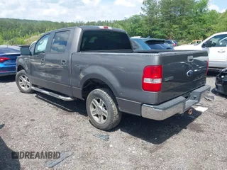 2005 Ford F-150 XLT with VIN 1FTPW12515KE80153, listed as a IAAI auction lot 42057009 with 135,454 mi miles. Bid and sale history available at carsss.com. Image 3.