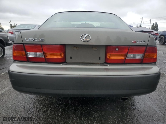 1998 Lexus ES 300 Luxury Sport Sdn with VIN JT8BF28G5W5019240, listed as a Copart auction lot 51010885 with 84,785 mi miles and Salvage Title. Bid and sale history available at carsss.com. Image 6.