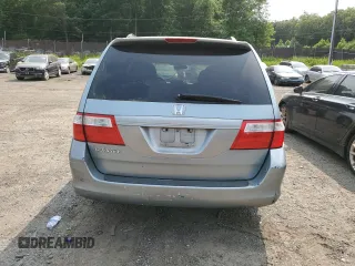 2006 Honda Odyssey EX z VIN 5FNRL38416B122268, wystawiony jako Copart lot #58969785 z przebiegiem 167 991 mil mil oraz Szkoda całkowita • Salvage title. Historia ofert i sprzedaży dostępna na DreamBid. Obrazek 6.