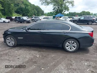 2015 BMW 7 Series 740Li xDrive with VIN WBAYF4C55FG291723, listed as a IAAI auction lot 42694382 with 101,140 mi miles and . Bid and sale history available at DreamBid. Image 14.