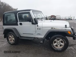 2006 Jeep Wrangler X with VIN 1J4FA39SX6P709588, listed as a IAAI auction lot 41927435 with 227,990 mi miles. Bid and sale history available at carsss.com. Image 13.