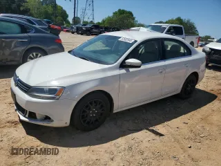 2013 Volkswagen Jetta SE z VIN 3VWDX7AJ0DM221837, wystawiony jako Copart lot #52502565 z przebiegiem 148 730 mil mil oraz Szkoda całkowita • Salvage title. Historia ofert i sprzedaży dostępna na DreamBid. Obrazek 1.