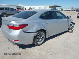 2013 Lexus ES 4dr Sdn with VIN JTHBK1GG2D2045719, listed as a IAAI auction lot 41854022 with 148,856 mi miles. Bid and sale history available at carsss.com. Image 4.