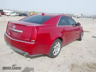 2009 Cadillac CTS RWD w/1SA with VIN 1G6DF577490135353, listed as a IAAI auction lot 41724476 with 128,062 mi miles. Bid and sale history available at carsss.com. Image 4.