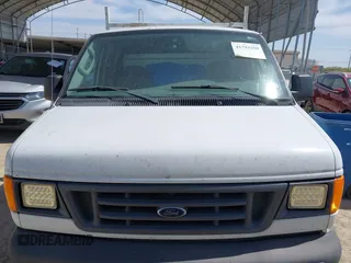 2004 Ford Econoline Cargo with VIN 1FTRE14W44HA29084, listed as a IAAI auction lot 41793350 with 123,429 mi miles. Bid and sale history available at carsss.com. Image 12.