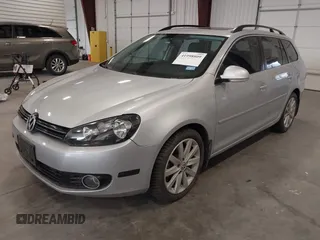 2012 Volkswagen Jetta SportWagen TDI with VIN 3VWML7AJ4CM668312, listed as a IAAI auction lot 41998809 with 130,866 mi miles. Bid and sale history available at carsss.com. Image 2.