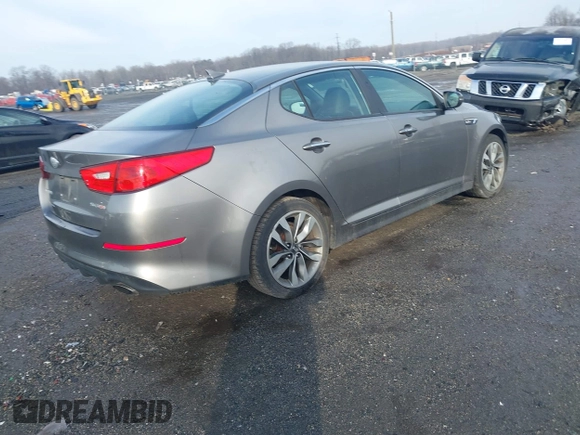 2014 Kia Optima SX Turbo with VIN 5XXGR4A64EG286133, listed as a IAAI auction lot 41489575 with 68,573 mi miles and . Bid and sale history available at DreamBid. Image 4.