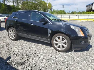 2015 Cadillac SRX Premium Collection z VIN 3GYFNGE30FS634363, wystawiony jako Copart lot #57216215 z przebiegiem 146 818 mil mil oraz Tytuł czysty. Historia ofert i sprzedaży dostępna na DreamBid. Obrazek 4.