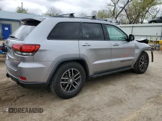 2018 Jeep Grand Cherokee Trailhawk with VIN 1C4RJFLG8JC164774, listed as a Copart auction lot 51699845 with 104,467 mi miles and Salvage title. Bid and sale history available at DreamBid. Image 3.