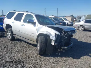 2013 Chevrolet Tahoe LTZ with VIN 1GNSKCE08DR320916, listed as a IAAI auction lot 42172878 with 168,766 mi miles and . Bid and sale history available at DreamBid. Image 1.
