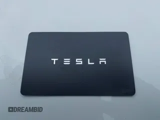 2023 Tesla Model Y Long Range z VIN 7SAYGAEEXPF647352, wystawiony jako IAAI lot #41955933 z przebiegiem Nie podano mil oraz . Historia ofert i sprzedaży dostępna na DreamBid. Obrazek 11.