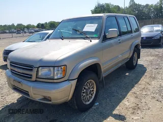 2002 Isuzu Trooper S with VIN JACDJ58X527J09916, listed as a IAAI auction lot 42603637 with 177,237 mi miles and . Bid and sale history available at DreamBid. Image 2.
