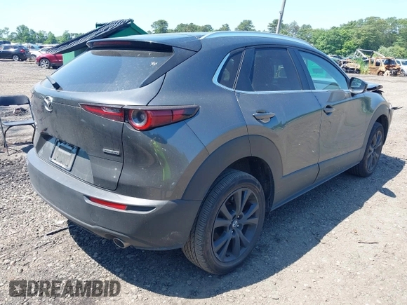 2024 Mazda CX-30 S Select Sport with VIN 3MVDMBBM9RM641576, listed as a IAAI auction lot 42541454 with 40,271 mi miles and . Bid and sale history available at DreamBid. Image 4.