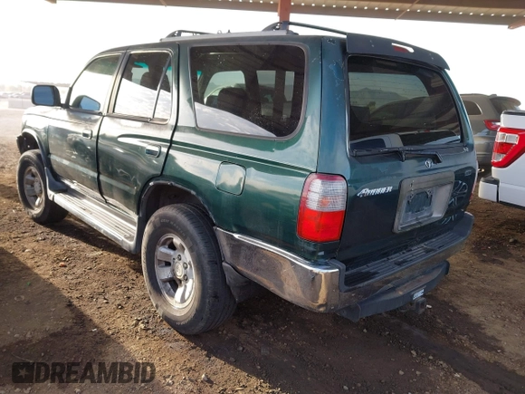 1999 Toyota 4Runner SR5 z VIN JT3GN86R4X0129944, wystawiony jako IAAI lot #41537597 z przebiegiem 361 416 mil mil oraz . Historia ofert i sprzedaży dostępna na DreamBid. Obrazek 3.