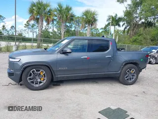2022 Rivian R1T Launch Edition with VIN 7FCTGAAL9NN004060, listed as a IAAI auction lot 41637884 with 40,268 mi miles. Bid and sale history available at carsss.com. Image 15.