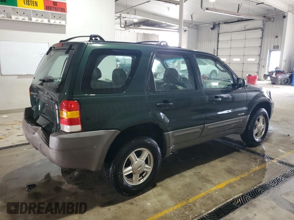 2002 Ford Escape XLS Value with VIN 1FMYU01B32KC48043, listed as a Copart auction lot 63011005 with 167,185 mi miles and Salvage title. Bid and sale history available at DreamBid. Image 3.