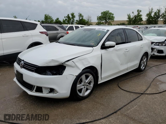 2014 Volkswagen Jetta TDI w/Premium with VIN 3VWLL7AJ2EM410482, listed as a Copart auction lot 53691984 with 77,421 mi miles and Salvage title. Bid and sale history available at DreamBid. Image 1.