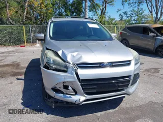 2016 Ford Escape Titanium with VIN 1FMCU0JX2GUC39416, listed as a IAAI auction lot 41793375 with 146,877 mi miles. Bid and sale history available at carsss.com. Image 6.
