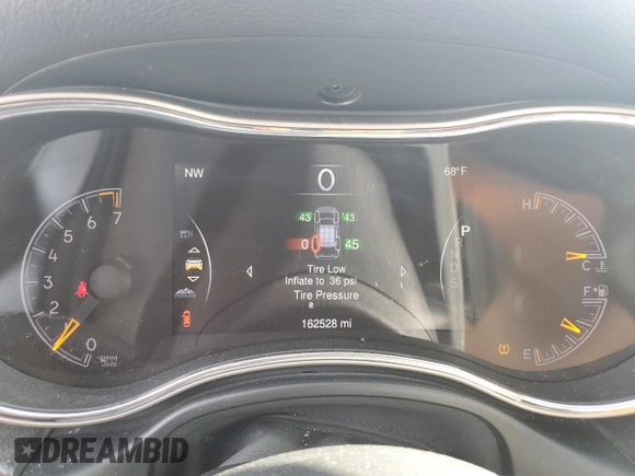 2014 Jeep Grand Cherokee Limited with VIN 1C4RJFBG4EC299273, listed as a Copart auction lot 59660695 with 162,528 mi miles and Salvage title. Bid and sale history available at DreamBid. Image 9.