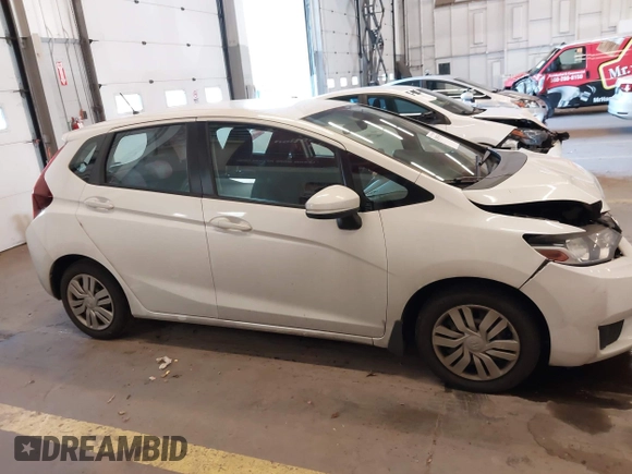 2015 Honda Fit LX with VIN 3HGGK5H57FM106670, listed as a IAAI auction lot 42097655 with 116,303 mi miles and . Bid and sale history available at DreamBid. Image 13.