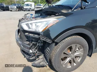 2014 Hyundai Santa Fe with VIN 5XYZUDLB9EG187420, listed as a IAAI auction lot 42369989 with 181,713 mi miles and . Bid and sale history available at DreamBid. Image 6.