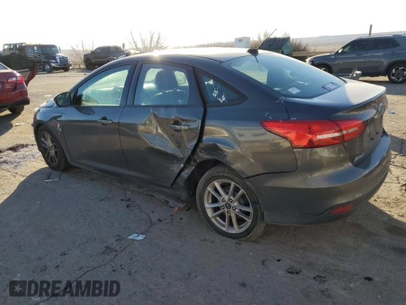 2016 Ford Focus SE with VIN 1FADP3F20GL346250, listed as a Copart auction lot 42645315 with 92,534 mi miles and Salvage title. Bid and sale history available at DreamBid. Image 2.