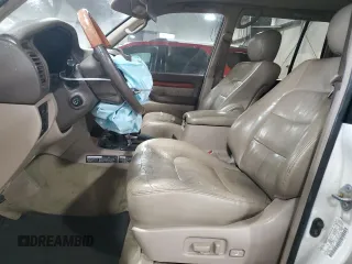 2000 Lexus LX 470 with VIN JT6HT00W9Y0109333, listed as a Copart auction lot 47589965 with 261,766 mi miles and Salvage Title. Bid and sale history available at DreamBid. Image 7.