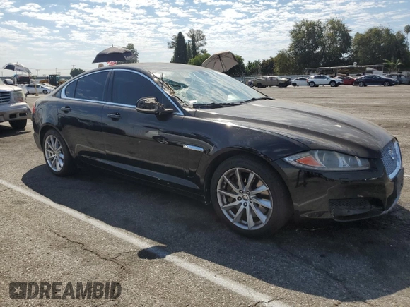 2013 Jaguar XF I4 RWD with VIN SAJWA0ES6DPS88882, listed as a Copart auction lot 70230634 with 84,496 mi miles and Salvage Title. Bid and sale history available at carsss.com. Image 4.