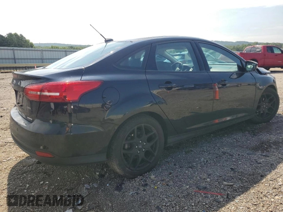 2016 Ford Focus SE with VIN 1FADP3F21GL228871, listed as a Copart auction lot 63506525 with 62,756 mi miles and Salvage title. Bid and sale history available at DreamBid. Image 3.