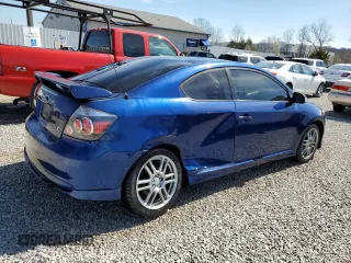 2009 Scion tC z VIN JTKDE167990286174, wystawiony jako Copart lot #49412835 z przebiegiem 91 031 mil mil oraz Nie do naprawy • Non repairable. Historia ofert i sprzedaży dostępna na DreamBid. Obrazek 3.