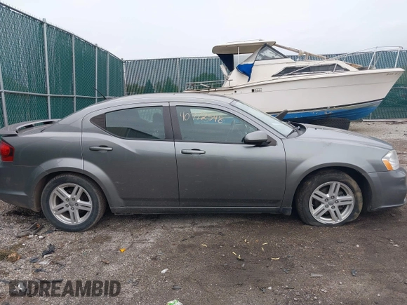 2013 Dodge Avenger SXT z VIN 1C3CDZCG0DN521540, wystawiony jako IAAI lot #40772548 z przebiegiem 145 455 mil mil oraz . Historia ofert i sprzedaży dostępna na DreamBid. Obrazek 13.