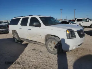 2014 GMC Yukon XL SLT with VIN 1GKS1KE07ER235724, listed as a Copart auction lot 84647084 with 192,625 mi miles and Salvage Title. Bid and sale history available at carsss.com. Image 4.