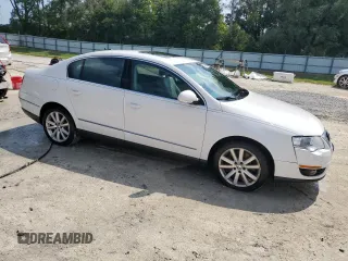 2006 Volkswagen Passat z VIN WVWFU93CX6P163702, wystawiony jako Copart lot #67068174 z przebiegiem 199 479 mil mil oraz Szkody całkowita. Historia ofert i sprzedaży dostępna na DreamBid. Obrazek 4.