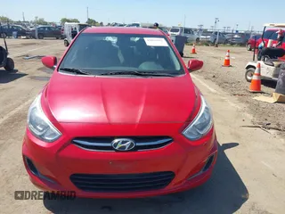 2015 Hyundai Accent GLS with VIN KMHCT4AE6FU817654, listed as a IAAI auction lot 42033692 with 134,335 mi miles and . Bid and sale history available at carsss.com. Image 12.