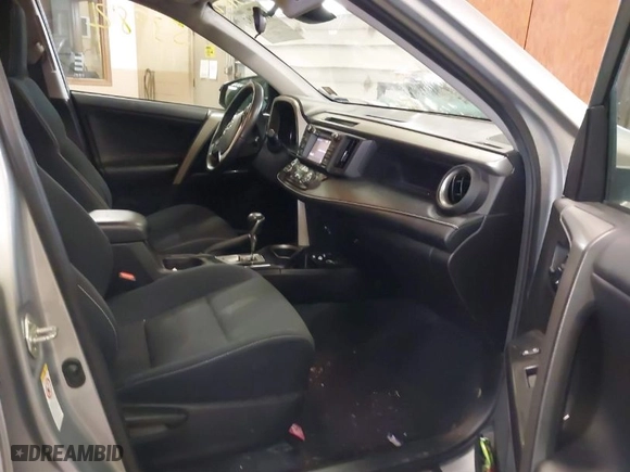 2018 Toyota RAV4 XLE with VIN 2T3RFREV4JW765403, listed as a IAAI auction lot 41853982 with 113,531 mi miles. Bid and sale history available at carsss.com. Image 5.