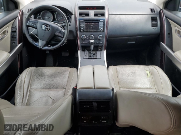 2015 Mazda CX-9 Grand Touring z VIN JM3TB3DV0F0461438, wystawiony jako Copart lot #61615275 z przebiegiem 212 252 mil mil oraz Szkoda całkowita • Salvage title. Historia ofert i sprzedaży dostępna na DreamBid. Obrazek 8.