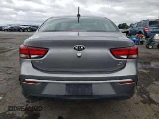 2021 Kia Rio S with VIN 3KPA24AD2ME401151, listed as a Copart auction lot 63223013 with 42,779 mi miles and Salvage Title. Bid and sale history available at DreamBid. Image 6.