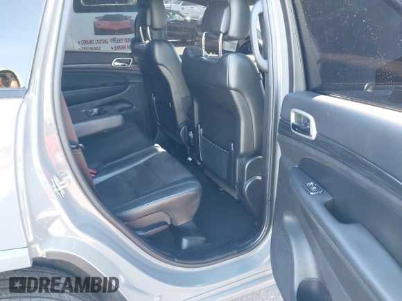 2021 Jeep Grand Cherokee Laredo E with VIN 1C4RJEAG3MC713511, listed as a IAAI auction lot 41235904 with 73,343 mi miles and . Bid and sale history available at DreamBid. Image 8.