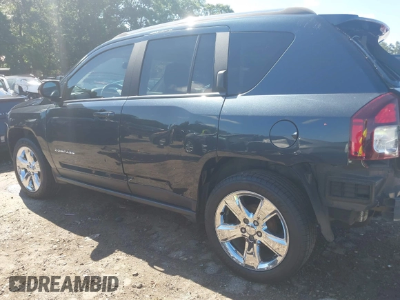 2015 Jeep Compass Latitude with VIN 1C4NJCEBXFD179373, listed as a IAAI auction lot 39380614 with 104,832 mi miles. Bid and sale history available at carsss.com. Image 15.
