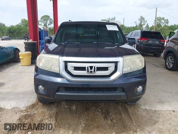 2011 Honda Pilot Touring z VIN 5FNYF3H94BB032105, wystawiony jako IAAI lot #42435522 z przebiegiem 247 899 mil mil oraz . Historia ofert i sprzedaży dostępna na DreamBid. Obrazek 12.