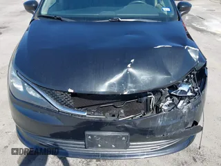 2017 Chrysler Pacifica Touring with VIN 2C4RC1DG6HR501164, listed as a IAAI auction lot 41863304 with 87,705 mi miles and . Bid and sale history available at DreamBid. Image 20.
