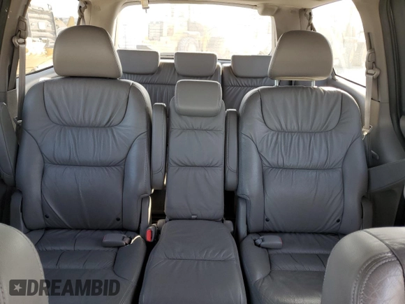2009 Honda Odyssey EX-L with VIN 5FNRL38799B034292, listed as a Copart auction lot 52547205 with 116,658 mi miles and Salvage Title. Bid and sale history available at DreamBid. Image 10.