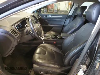 2014 Ford Fusion Titanium with VIN 3FA6P0K94ER231241, listed as a Copart auction lot 47886135 with 70,925 mi miles and Salvage Title. Bid and sale history available at DreamBid. Image 7.