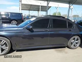 2019 BMW 7 Series 740i with VIN WBA7E2C53KB218375, listed as a IAAI auction lot 42008827 with 61,337 mi miles and . Bid and sale history available at DreamBid. Image 14.